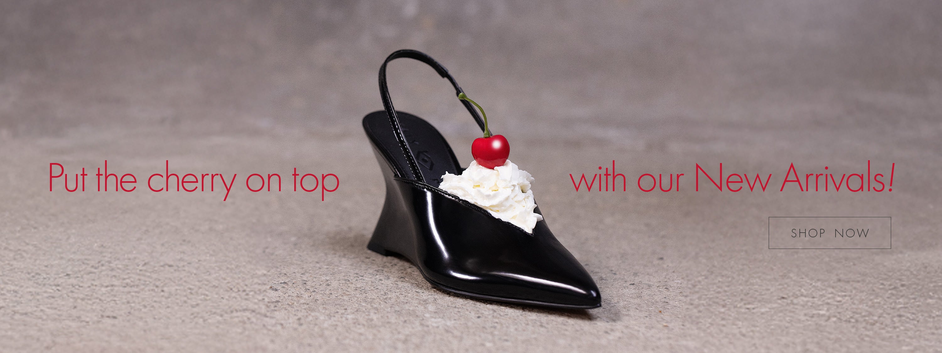 black patent wedge heels with whip cream and a cheery on top in the shoe